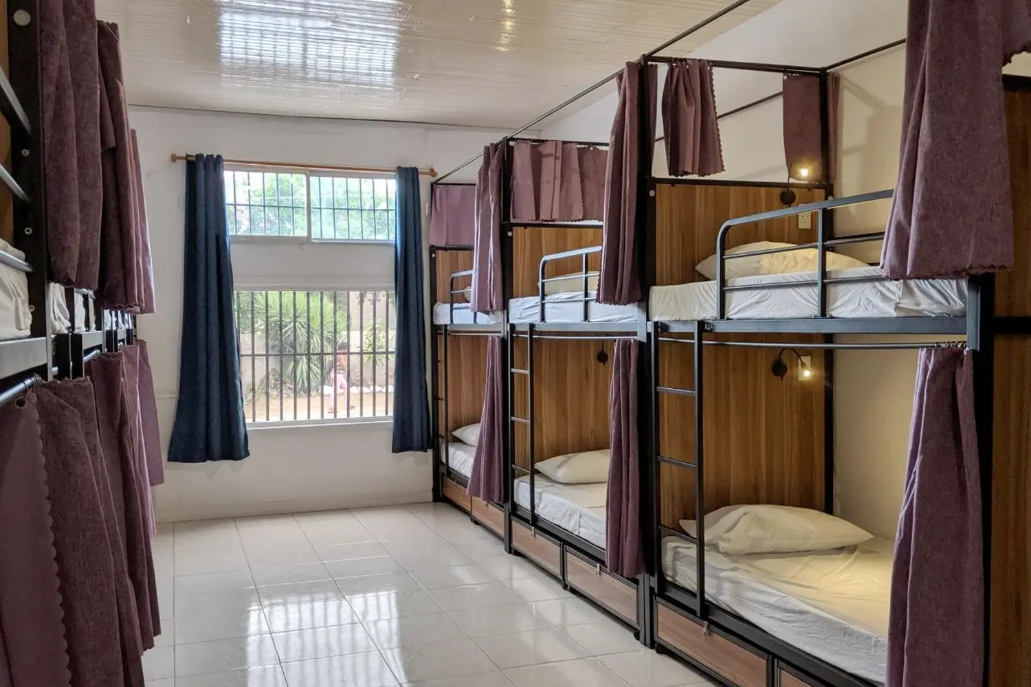 Bunk beds in a dorm room at Ragamuffin Hostel