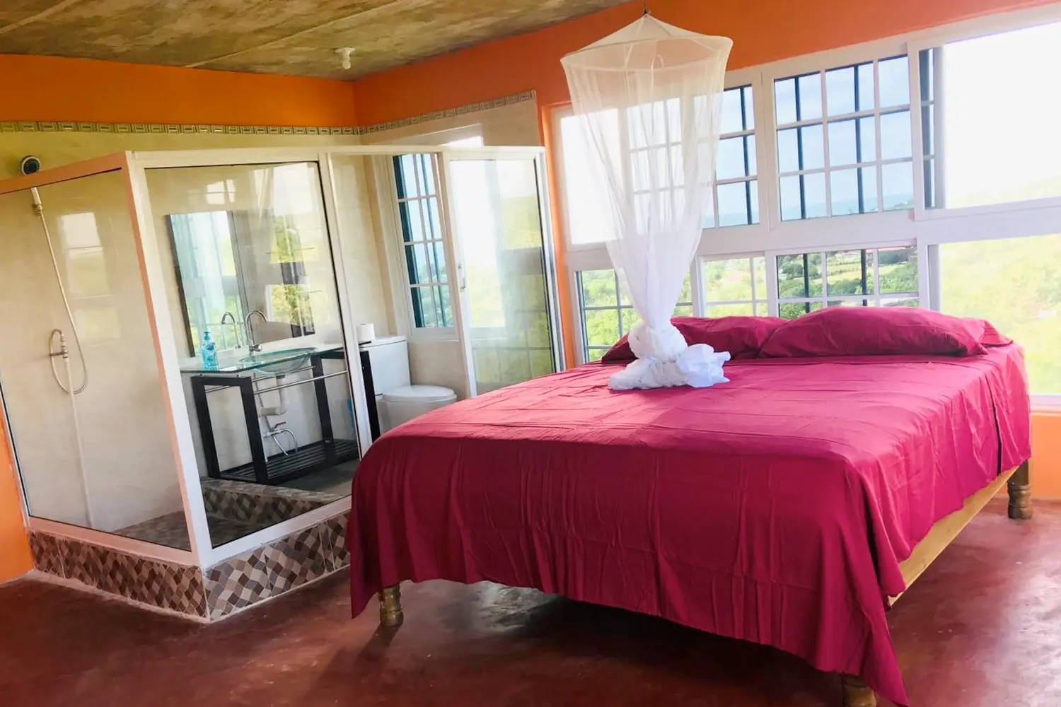 Bed and bath in a room at Welcoming Vibes