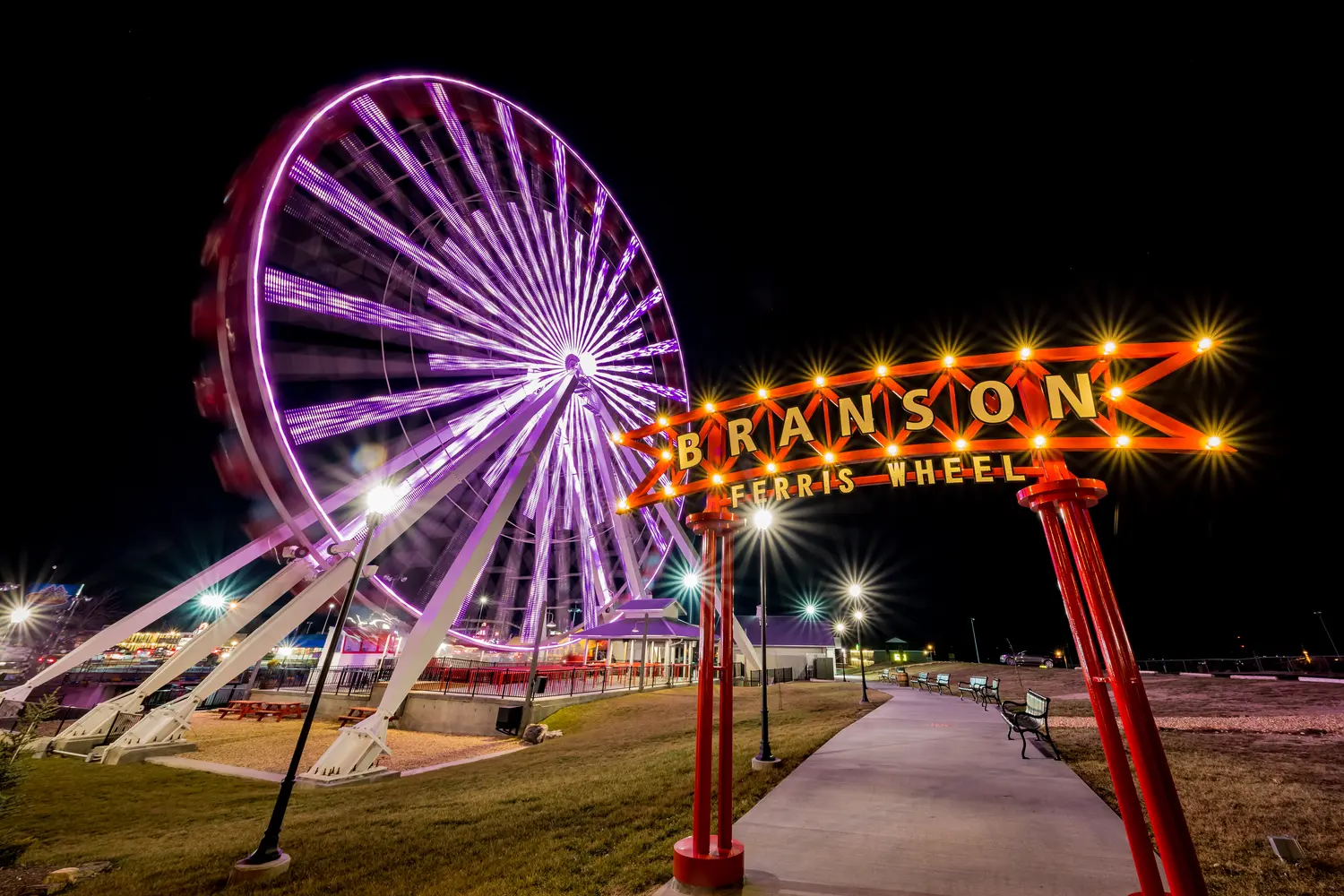 Branson Ferris Wheel illuminated at night.