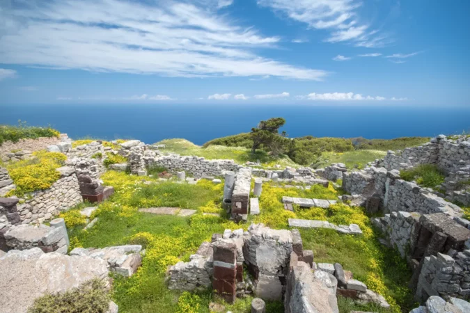 The ruins of Ancient Thera, a prehistoric village at the top of the mountain Mesa Vouno, Santorini, Greece.