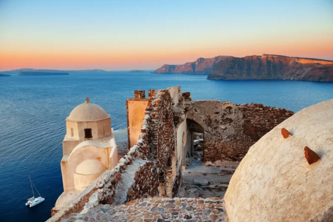 Sunset as seen from Oia Castle on Santorini, Greece
