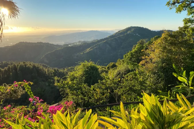 Mesmerizing view from veranda during sunset on mountain range, and Tropical National Forest of El Yunque in Puerto Rico