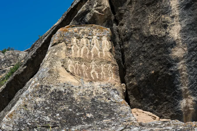 Ancient rock carvings petroglyphs in Gobustan National park. Exposition of Petroglyphs in Gobustan near Baku, Azerbaijan.