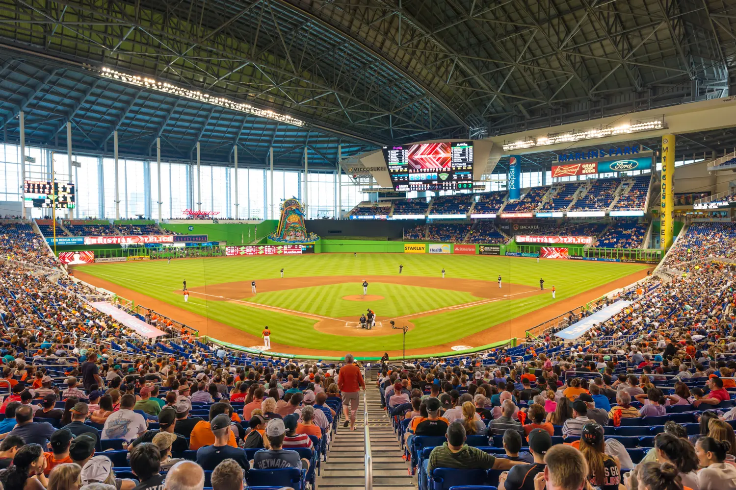 Fans watching a baseball game at the Miami Marlins Stadium