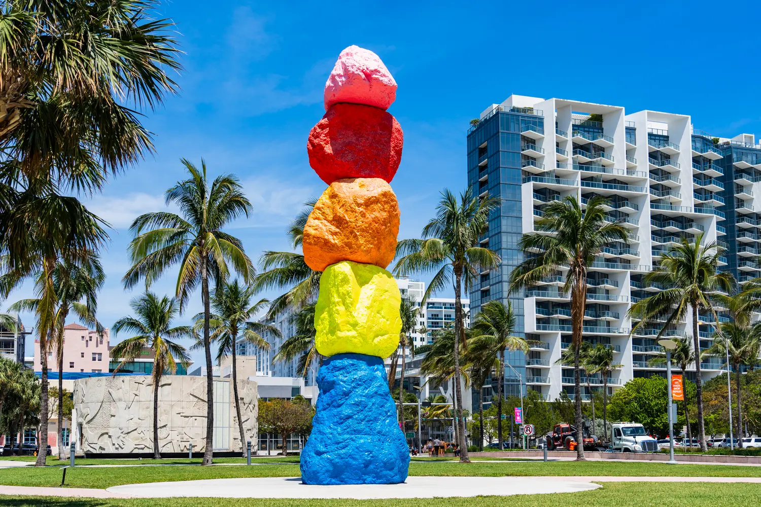 "Miami Mountain" by Ugo Rondinone is a 42 foot tall, brightly colored sculpture in Collins Park by the Bass Museum of Art in Miami, Florida