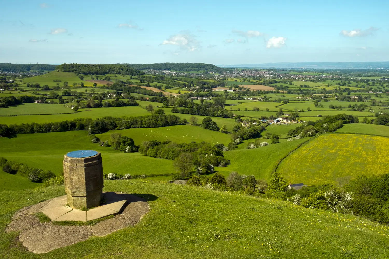 Cotswold Way long distance footpath passes the toposcope on Coaley Peak viewpoint near Nympsfield, Gloucestershire, UK