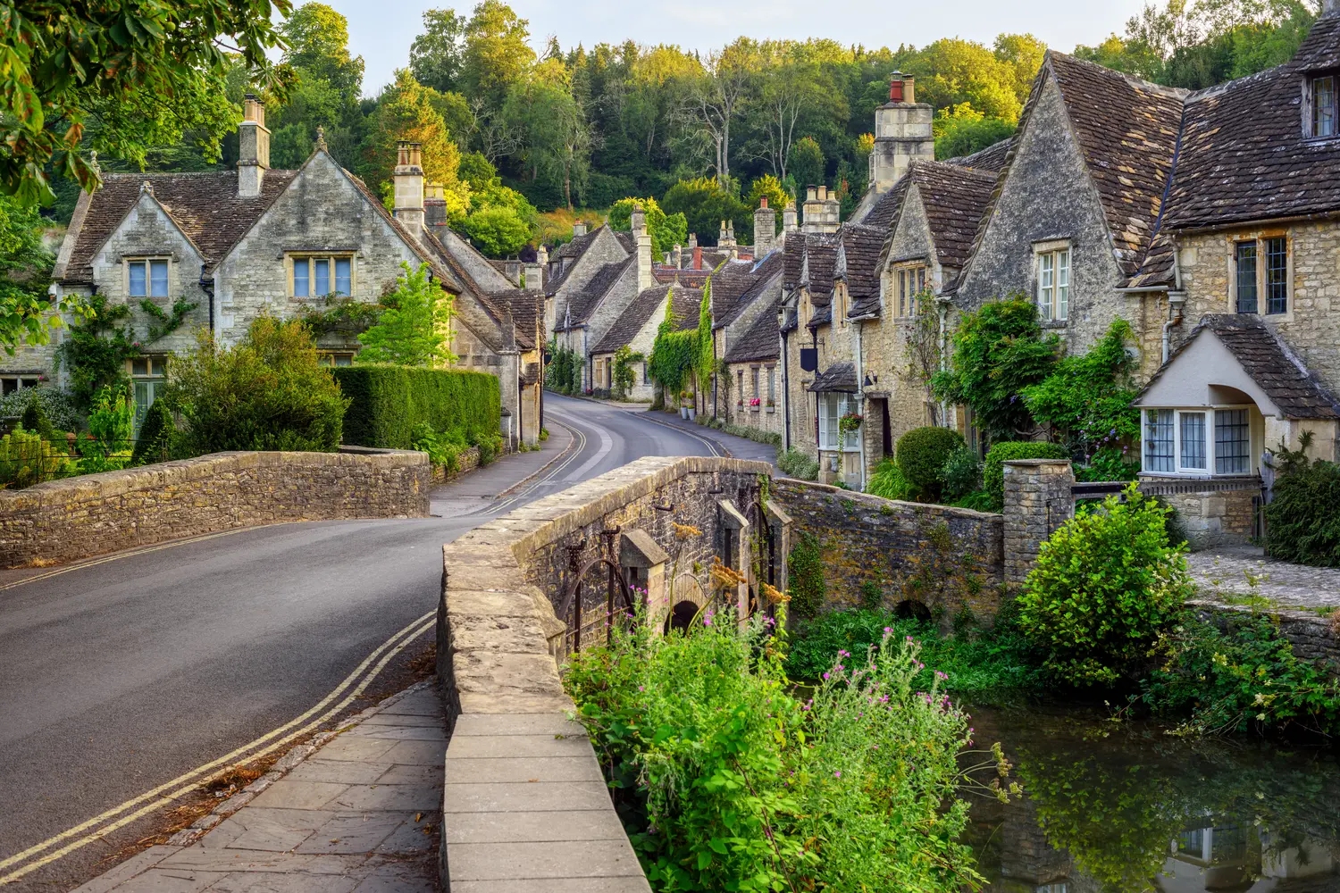 Traditional stone houses in Castle Combe village, one of the most picturesque villages in Cotswolds, England, United Kingdom