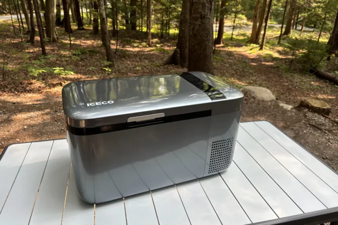 ICECO GO20 car fridge on table at camp