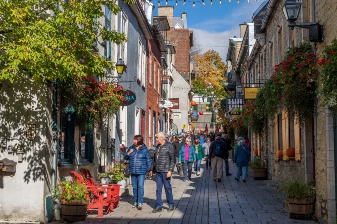 People walking on the Quartier du Petit Champlain street in Quebec City, Canada