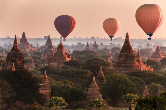 Hot air balloon over Bagan on misty morning, Myanmar