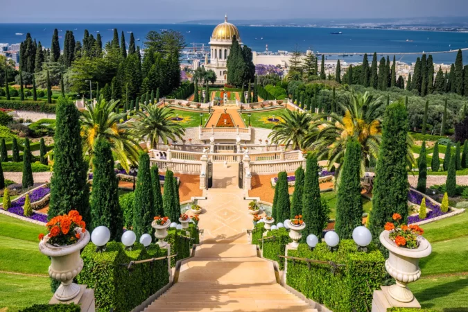 Bahai gardens and temple on the slopes of the Carmel Mountain and view of the Mediterranean Sea and bay of Haifa city, Israel