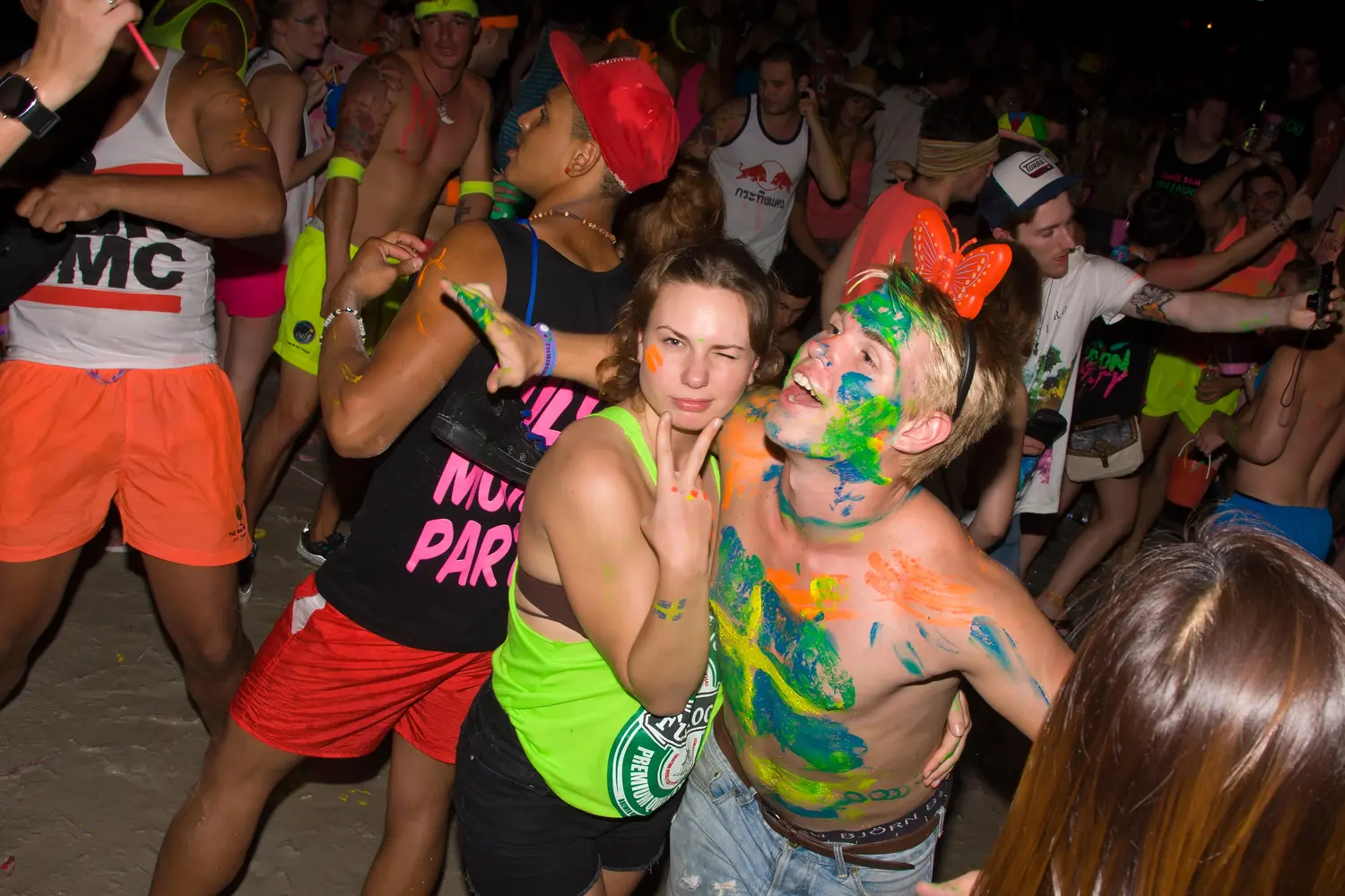 People partying at Thailand's Full Moon Party in Koh Phangan.