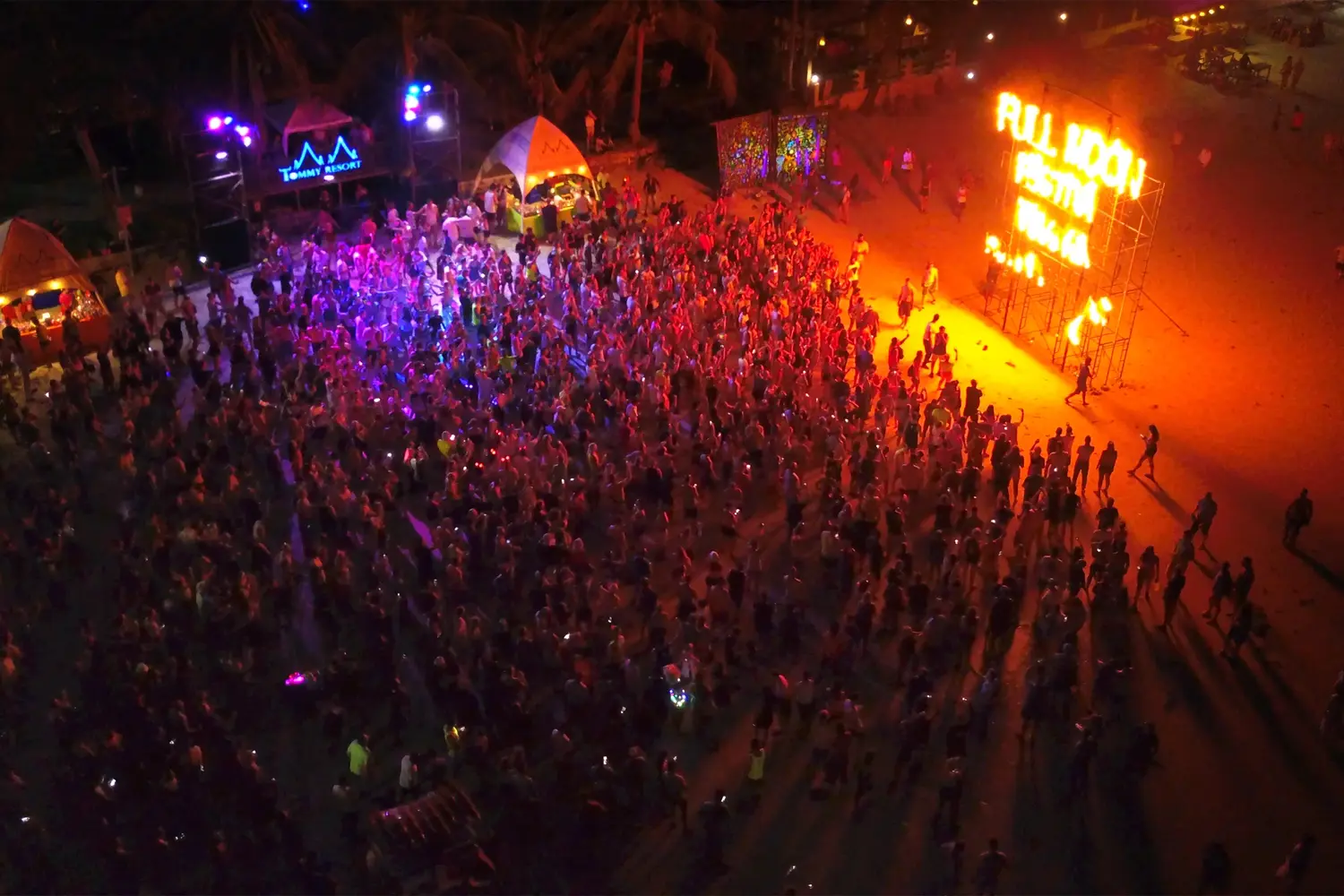 Aerial view of Haad Rin Beach during the Full Moon Party in Koh Phangan, Thailand.