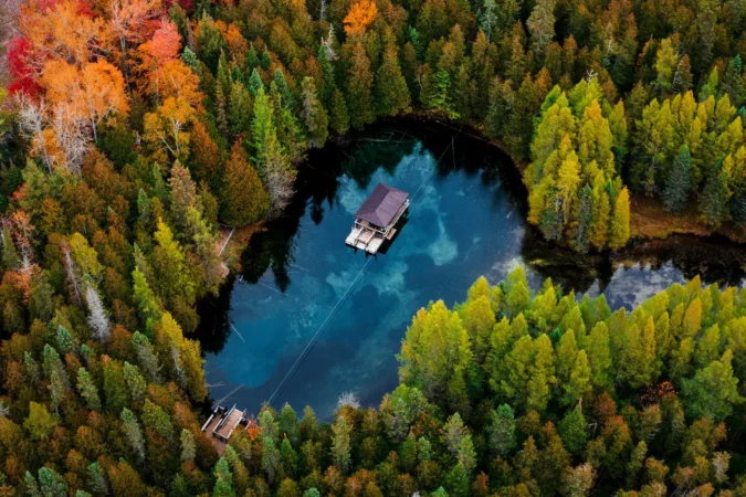 Aerial drone image of Kitch-iti-kipi, a natural freshwater spring in the Upper Peninsula of Michigan