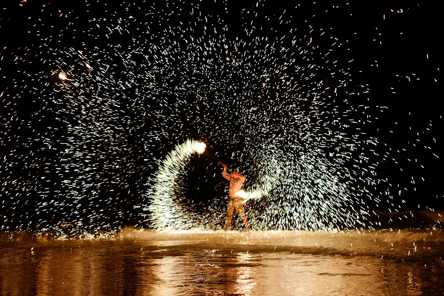 Fireshow at Thailand's Full Moon Party on Haad Rin Beach in Koh Phangan, Thailand