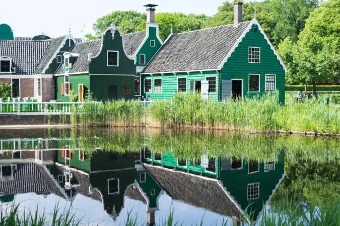 Water reflection of a traditional dutch building at Arnhem open air and national heritage museum, in Arnhem, Netherlands