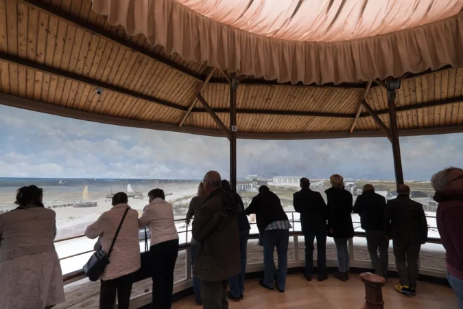 Visitors look at the famous giant cylindrical painting of Scheveningen of the Dutch painter Hendrik Willem Mesdag from an observation gallery in the Museum Mesdag, The Hague, Netherlands