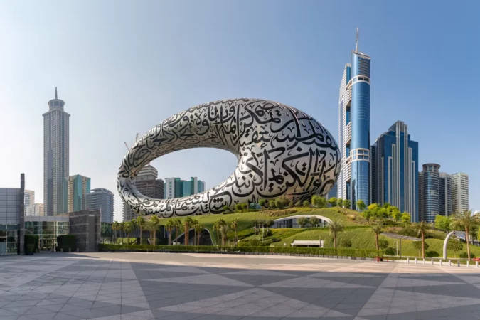 Museum of the Future and the nearby Trade Centre buildings in Dubai, UAE