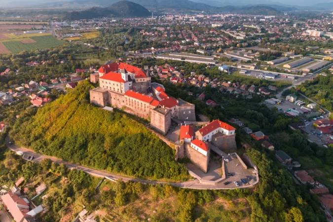 Palanok Castle towering above the city of Mukacheve, Ukraine.