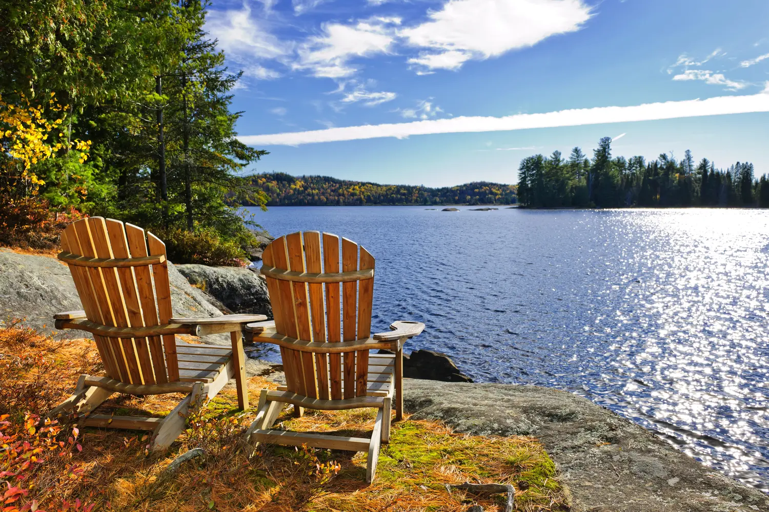 Adirondack chairs overlooking the lake at Algonquin Provincial Park in Canada