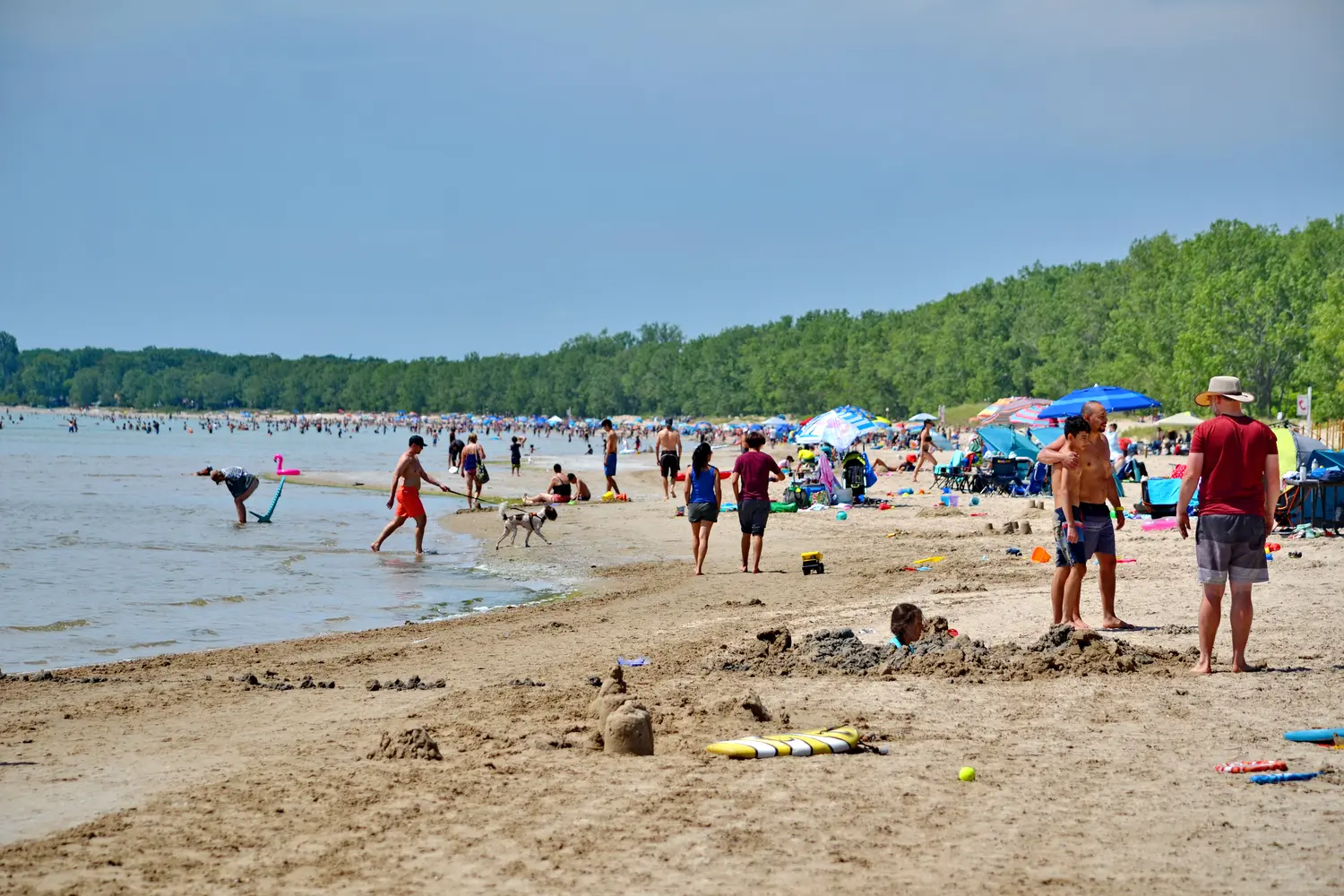 People enjoying the beach at Sandbanks Provincial Park in Ontario, Canada