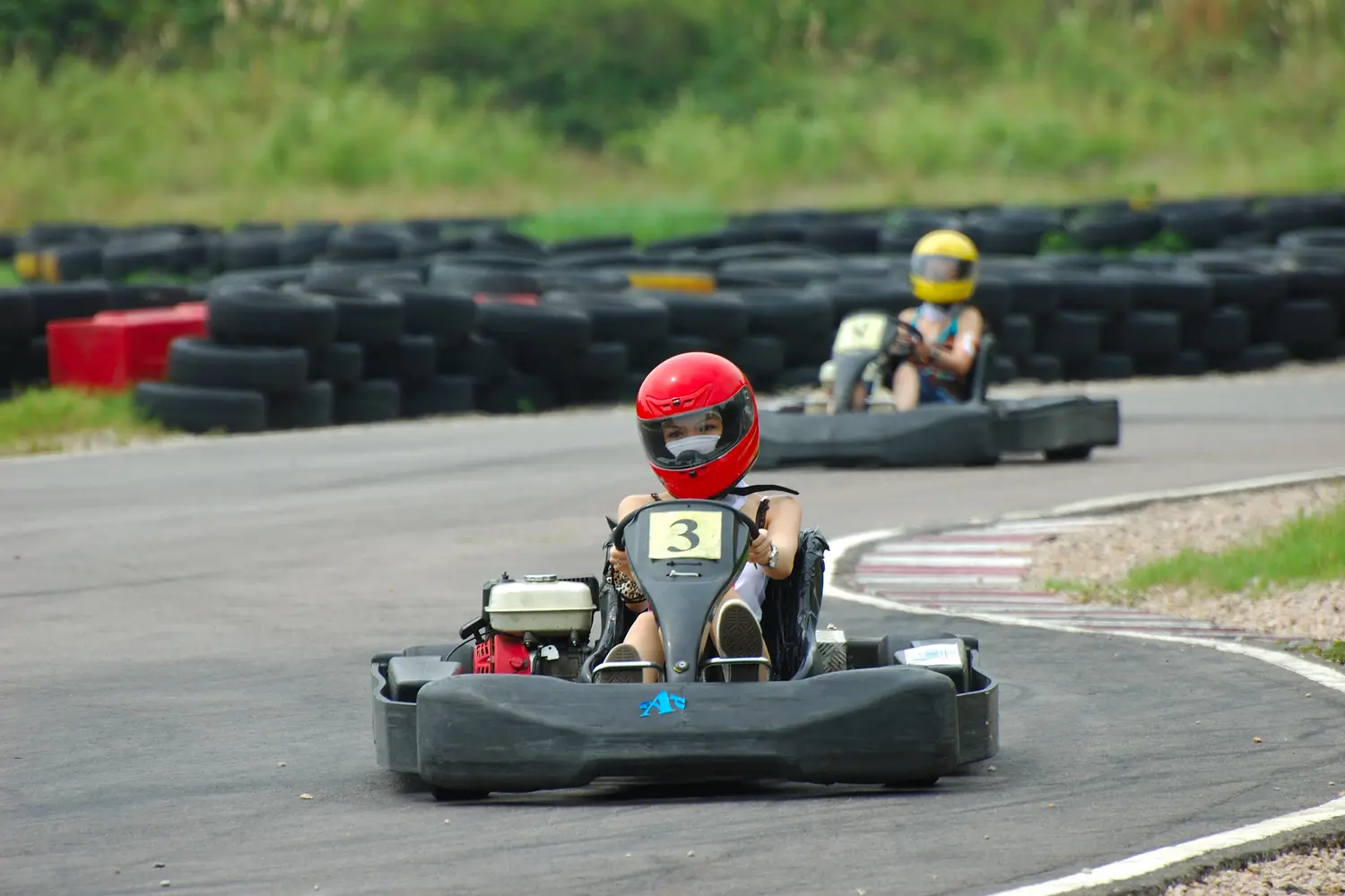 People go-karting