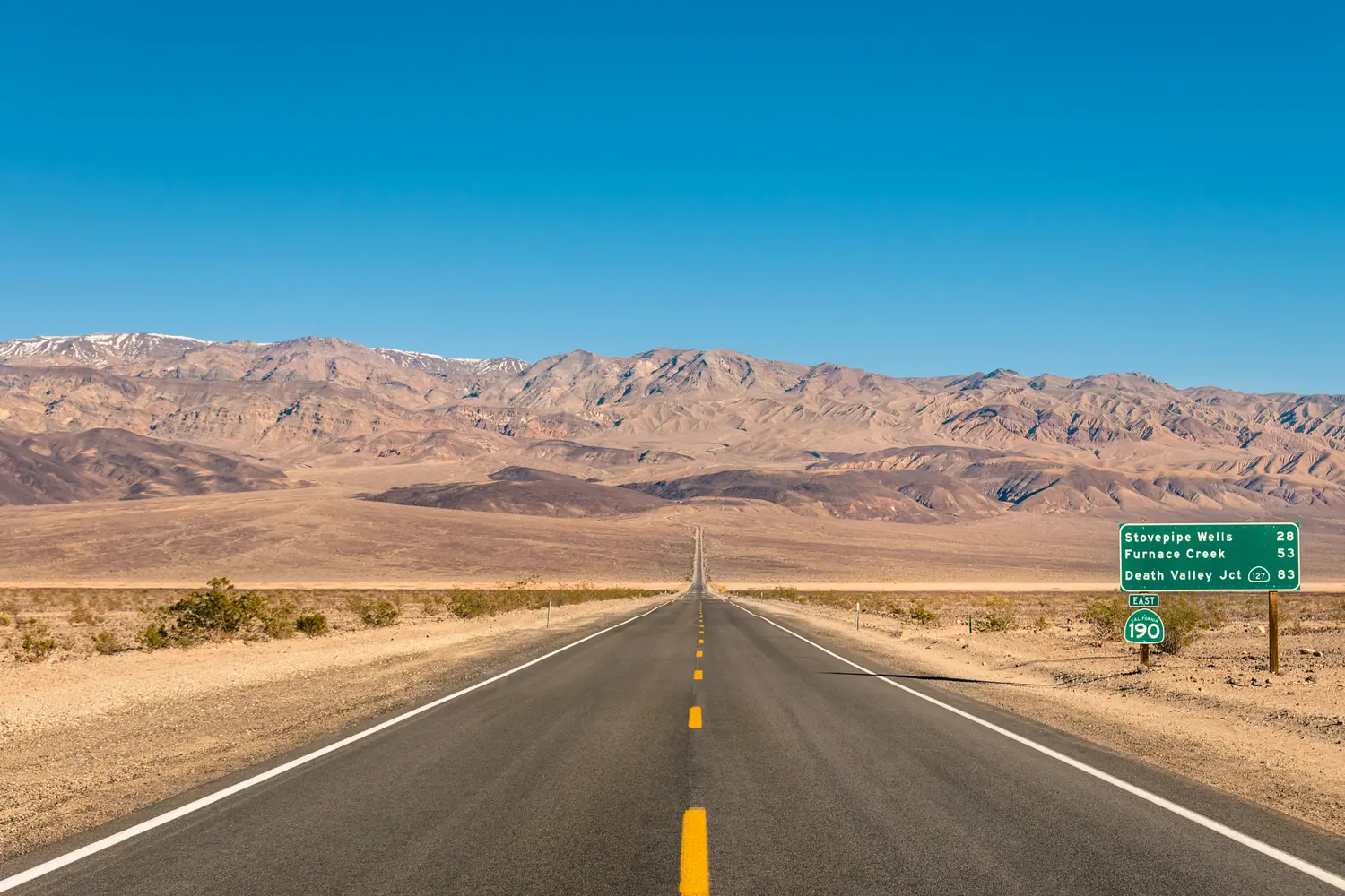 Road going through Death Valley National Park in California, USA