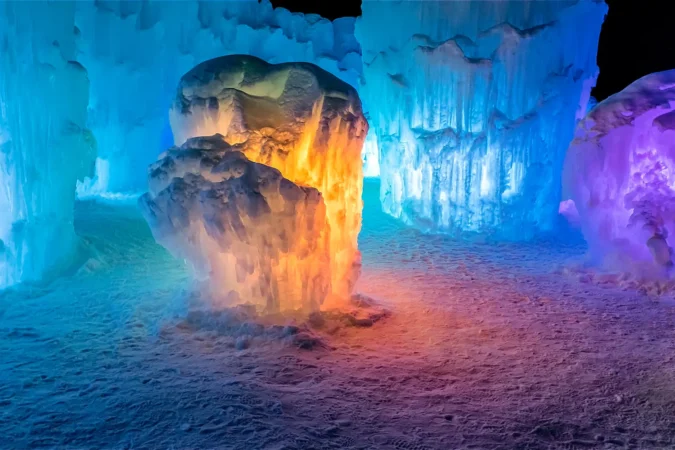 Colorful ice castle in New Hampshire