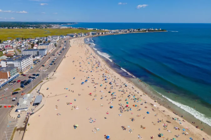 Hampton Beach aerial view including historic waterfront buildings on Ocean Boulevard and Hampton Beach State Park, New Hampshire