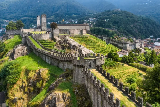 The ramparts of the Medieval Castelgrande fortress in the Alps mountains valley, Bellinzona city, Ticino canton, Switzerland