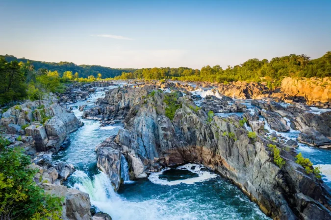 View of rapids in the Potomac River at sunset, at Great Falls Park, Virginia.